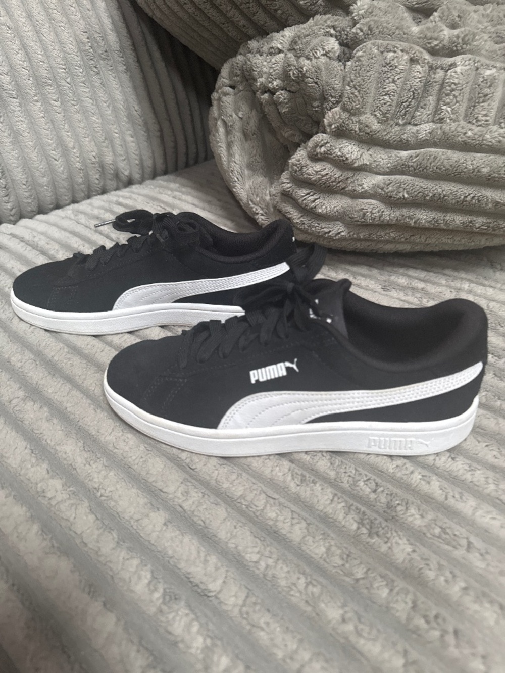 Black Puma sneakers